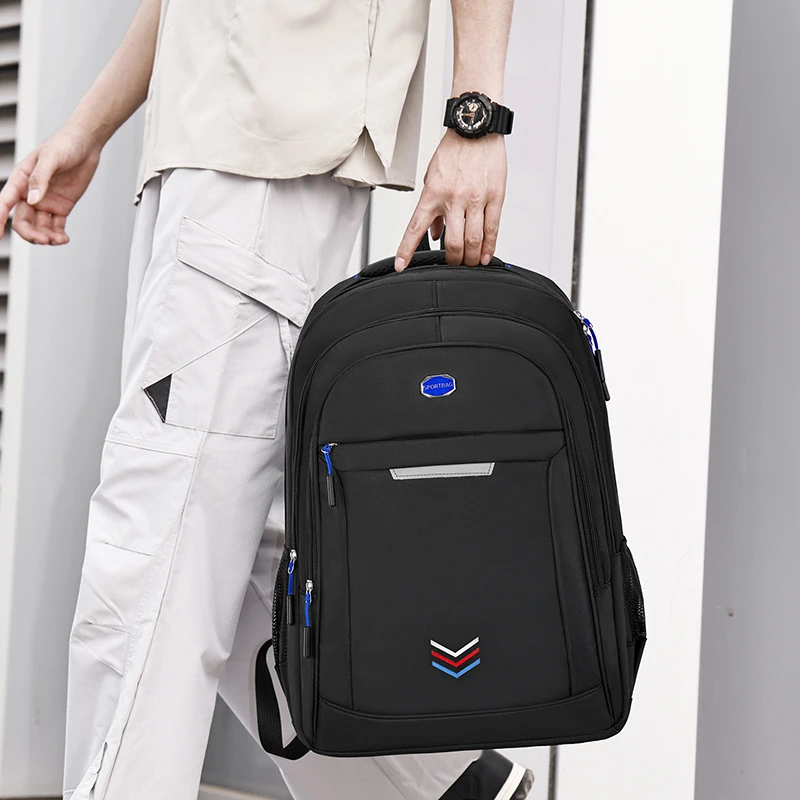 Large-capacity backpack - a durable and stylish laptop bag, equipped with a secure zipper closure and mesh side pockets
