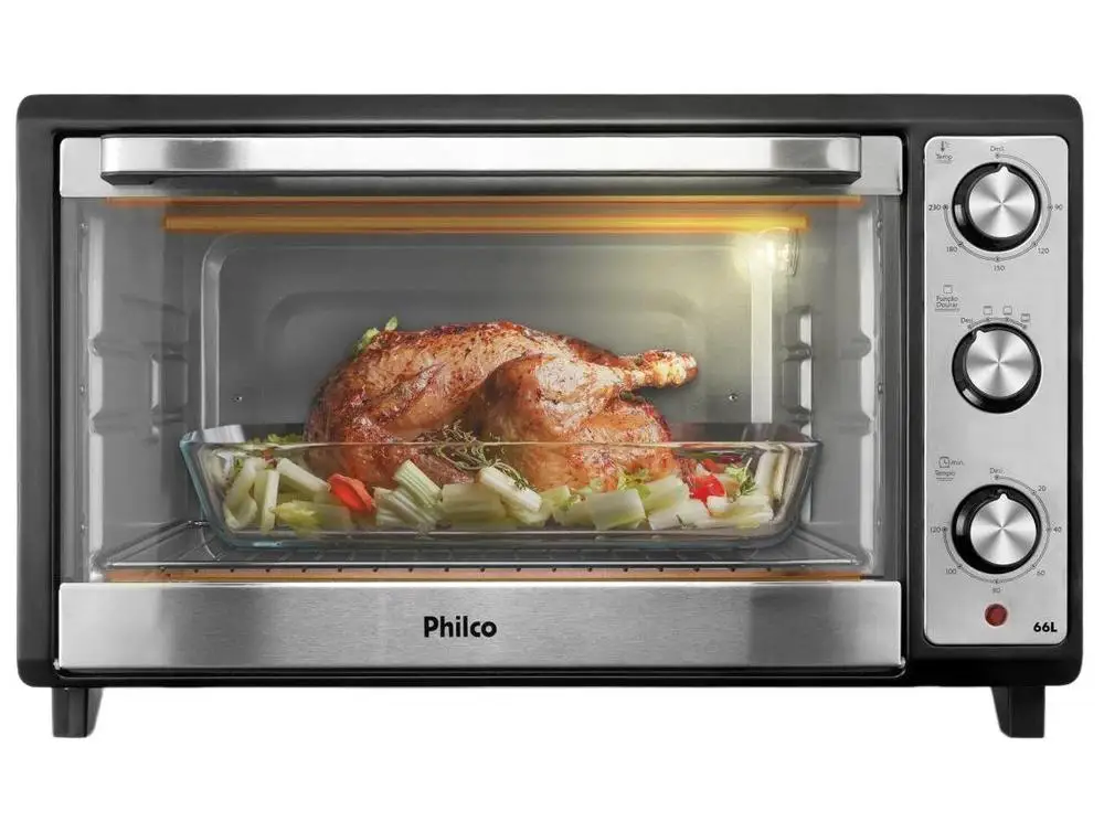 Vista frontal do Forno Elétrico Philco PFE66 com um frango assado em uma travessa de vidro dentro dele
