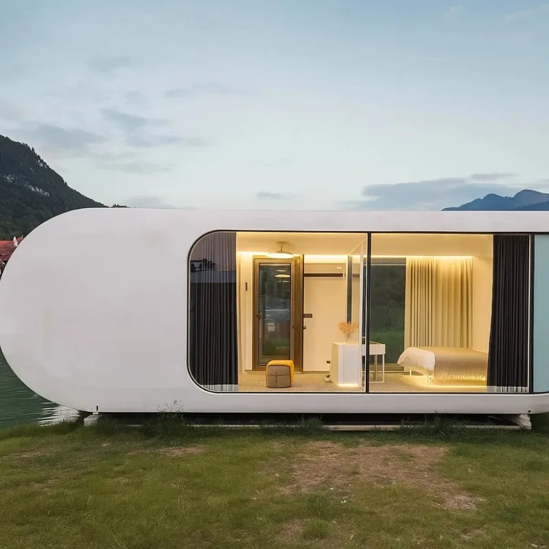บ้านสำเร็จรูป YG ขนาด 20 ฟุต แบบปรับแต่งได้ บ้านโมดูลาร์หรูหราขนาดเล็ก Apple Cabin 2 ห้องนอน บ้านขยายได้ แคปซูลอวกาศสำเร็จรูปเคลื่อนที่ได้ 1