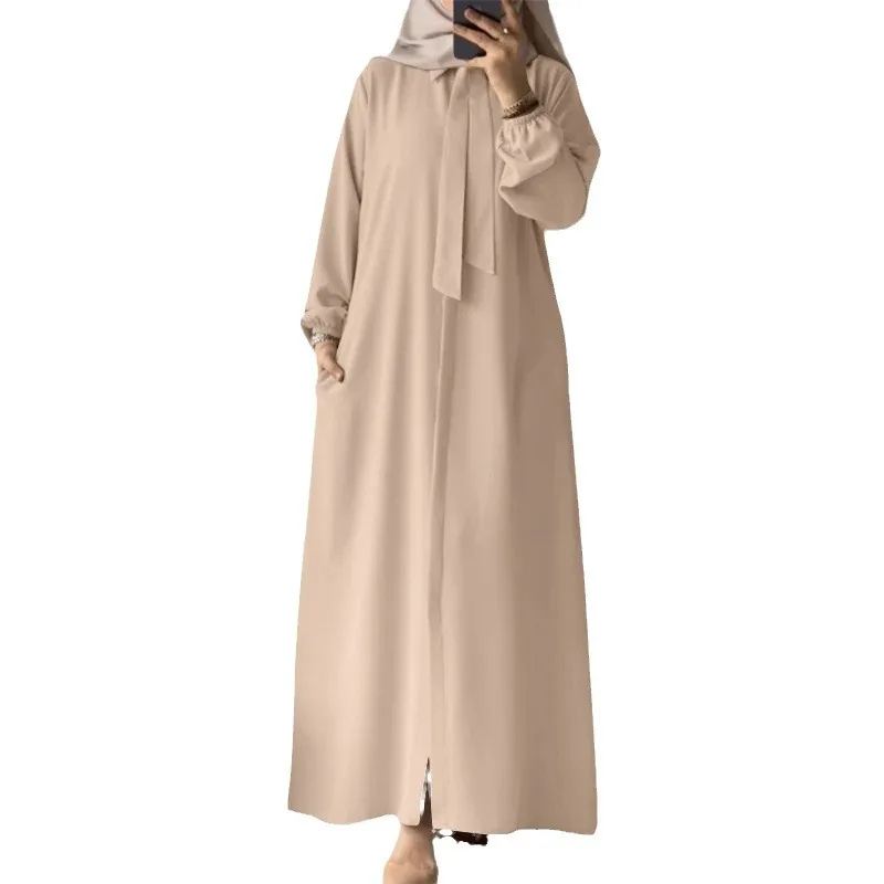 2024 Muslim Women's  Fashion Bow Tie Flip Collar Solid Color Long Sleeved Shirt Sun Skirt Pocket Loose Cardigan Long Dress