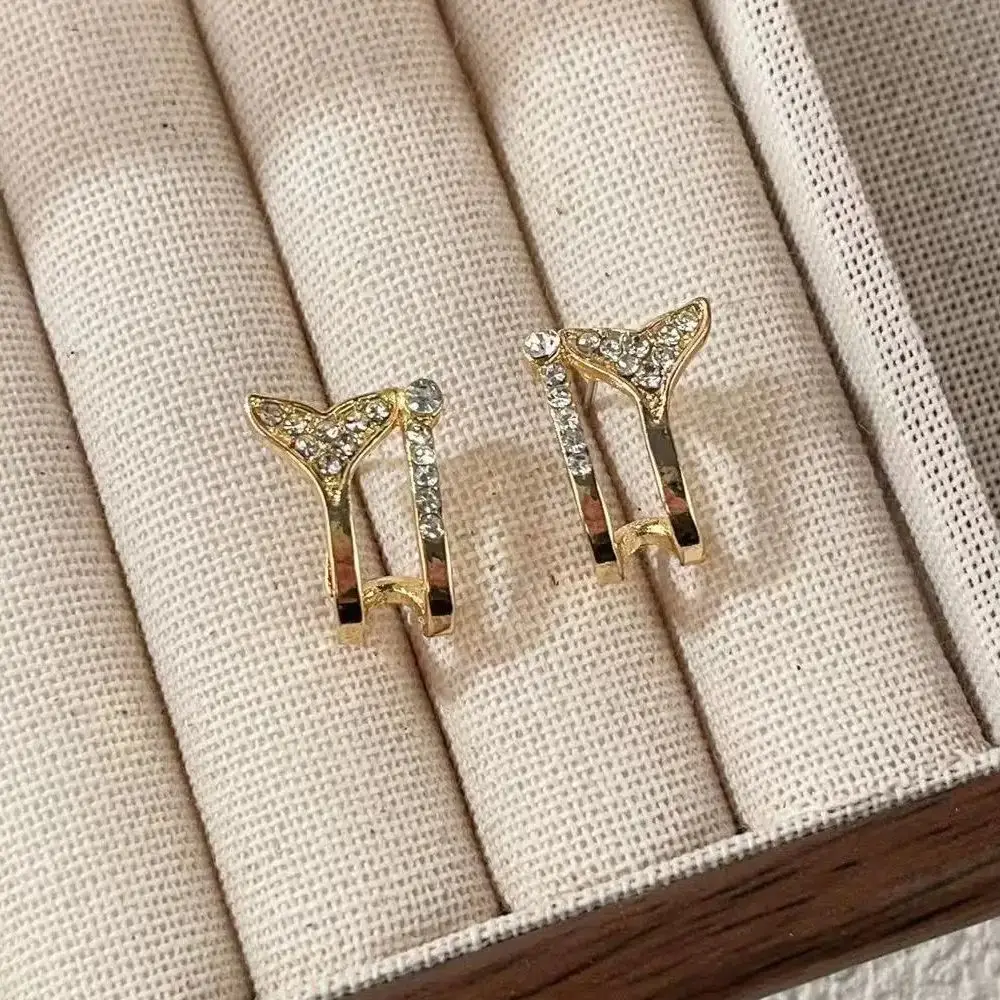 2026 New Golden Color Crystal Fish Tail Stud Earrings for Women New Fashion Gift Jewelry Retro U Shape Metal Statement Earrings