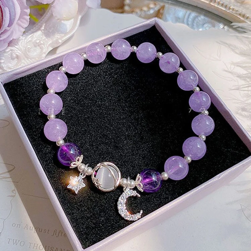 Bracciale elastico con perle cristallo blu e ciondolo a stella_voghion.com