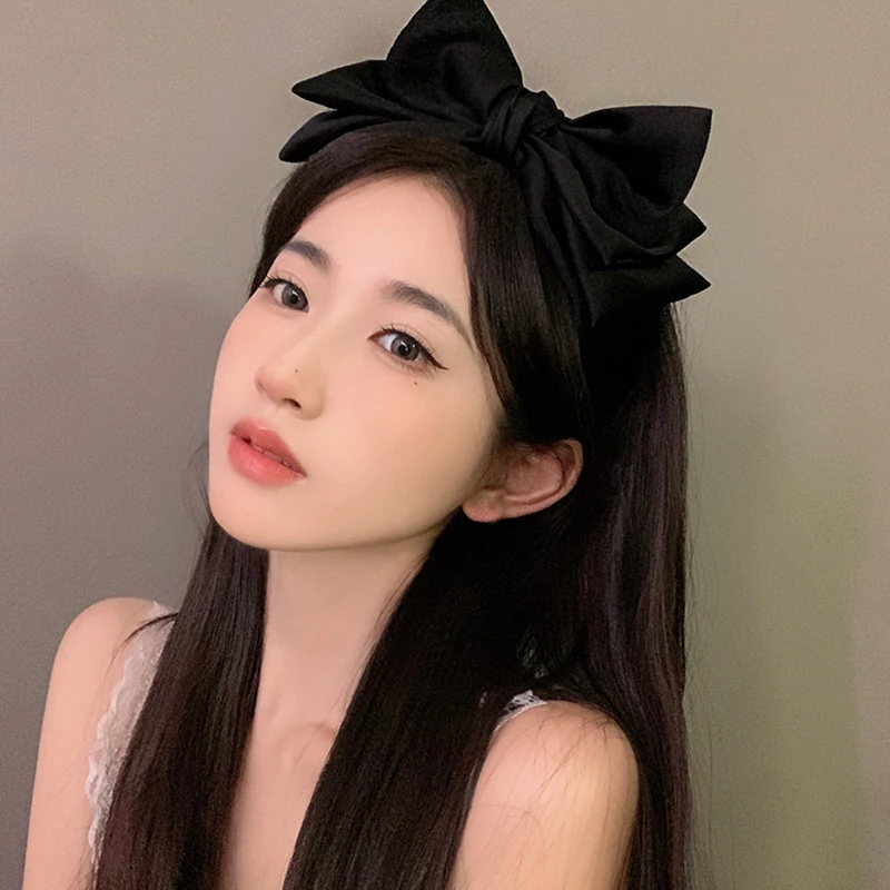 Stylish Headband with Black Bow Knot; Women's Korean Style Elegance in Hair Accessories.
