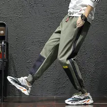 

2022Spring Pants Men's Fashion Ankle-Tied plus Size Loose Cargo Pants Cool and Wild Ankle-Tied Sports Casual Pants Men