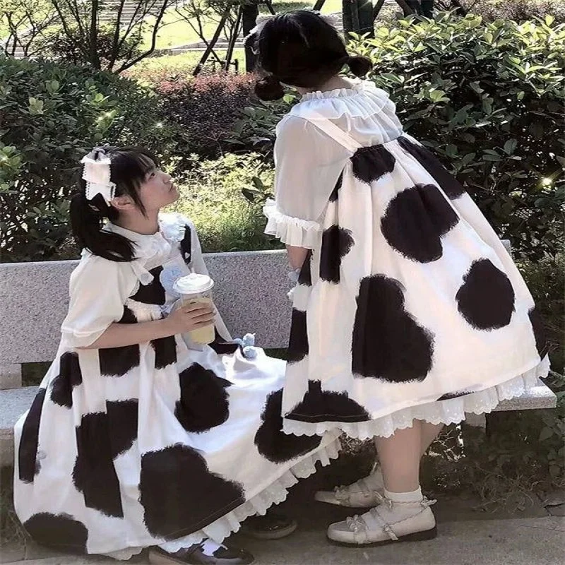 

spring and summer new Japanese soft girls cute cow print small strappy dress female student+doll collar shirt two-piece suit