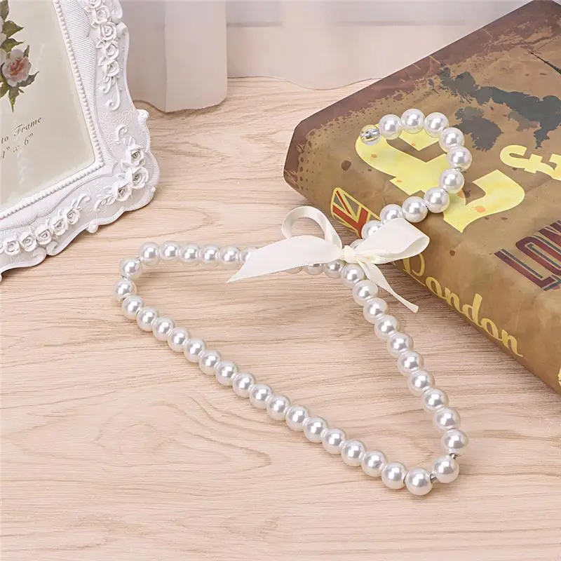 Fashion Plastic Pearl Bow Clothes Clothing Hanger For Kids Children Pet Dog for 4