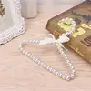 Fashion Plastic Pearl Bow Clothes Clothing Hanger For Kids Children Pet Dog for 4