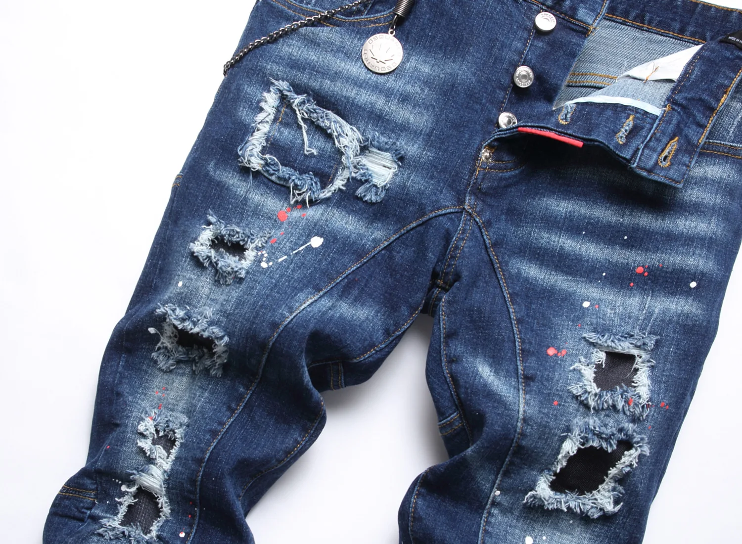 Men's slim-fit fashion Small feet embroidered jeans ripped applique stretch paint Splash Beggar pants trend