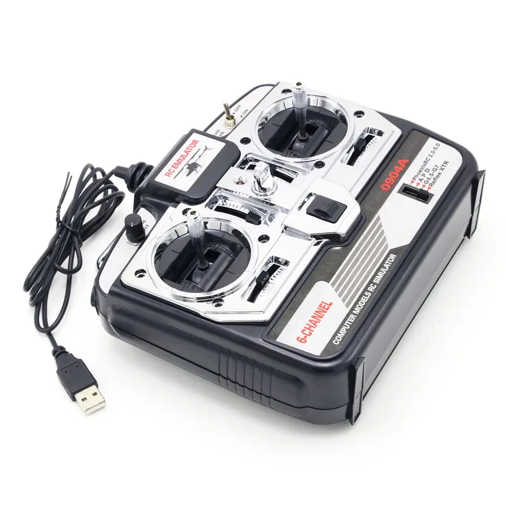 Manette du simulateur RC connectée à un ordinateur portable avec Phoenix 5.0 ouvert