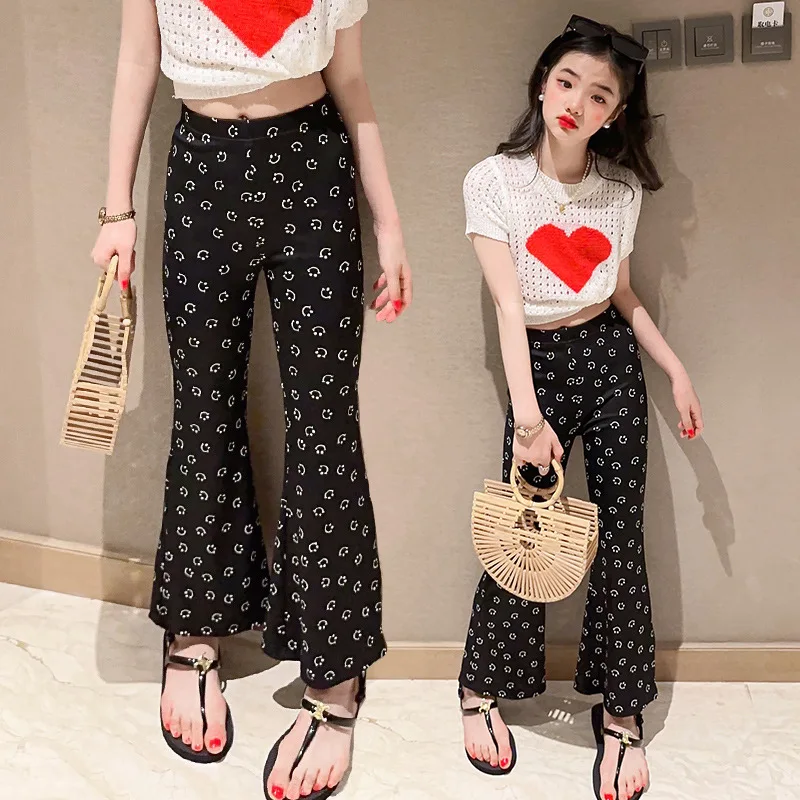 

Girls' lazy smiling face flare pants 2024 summer new Korean casual printing ice silk micro flare facial mask pants trend