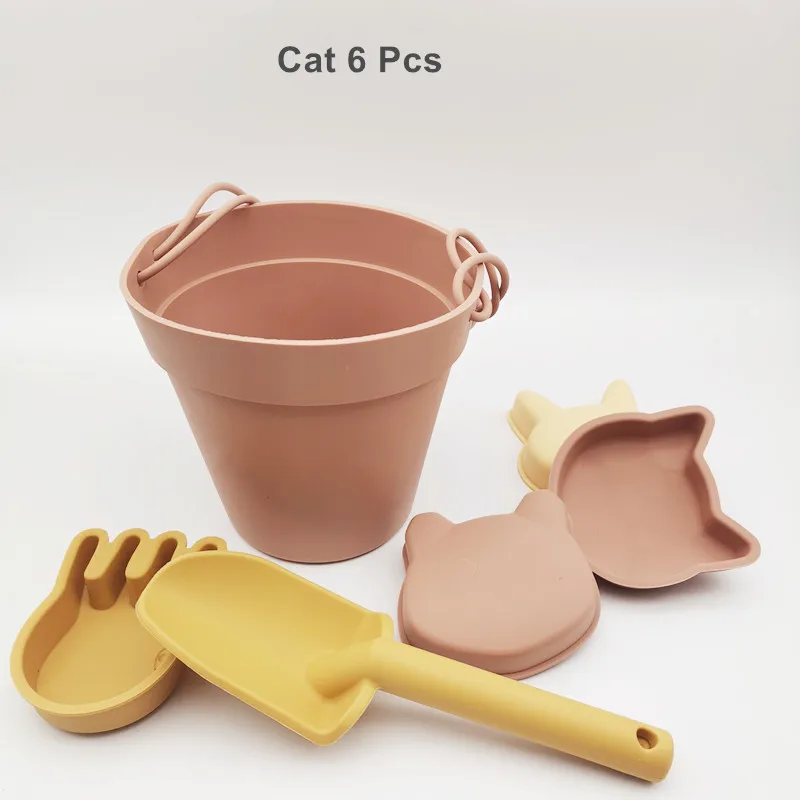Set di giochi da spiaggia in silicone per bambini con secchiello_voghion.com
