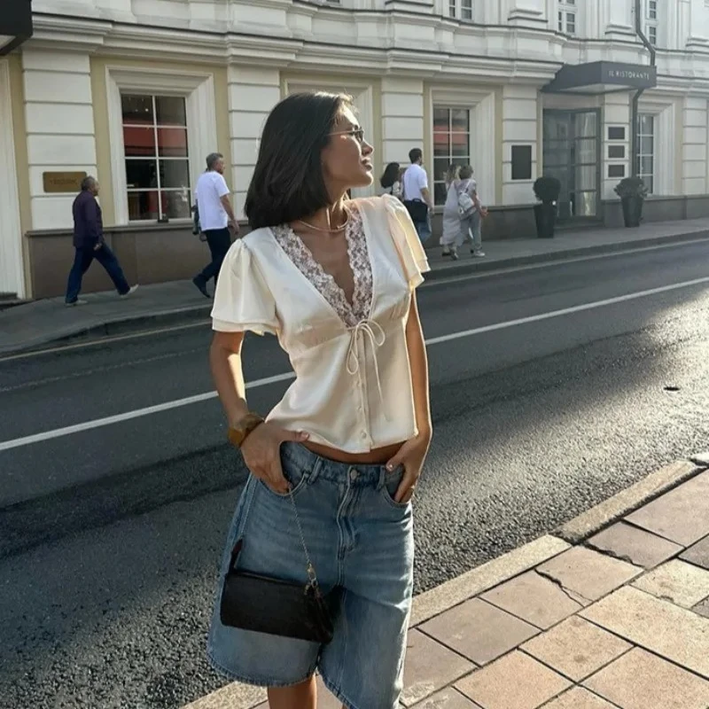 Lace Patchwork Women ‘s Shirts V Neck Hollow Out Short Sleeve Ruffle Trim Single Breasted Peplum Top 2026 Summer Woman Outwears 1