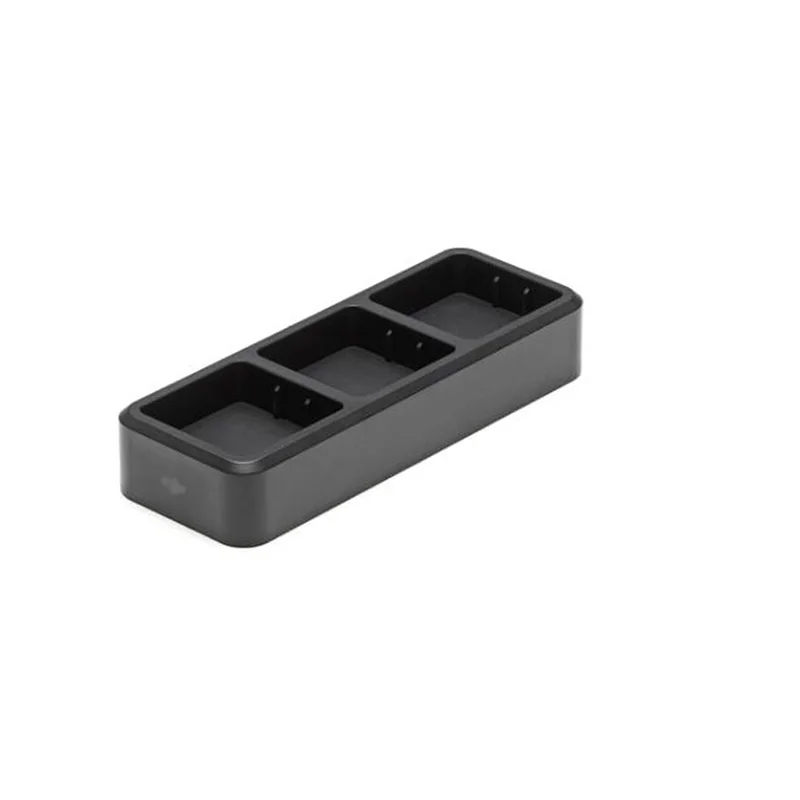Hub de charge intelligent Mavic 3 ouvert, montrant l'intérieur et les connecteurs de batterie.