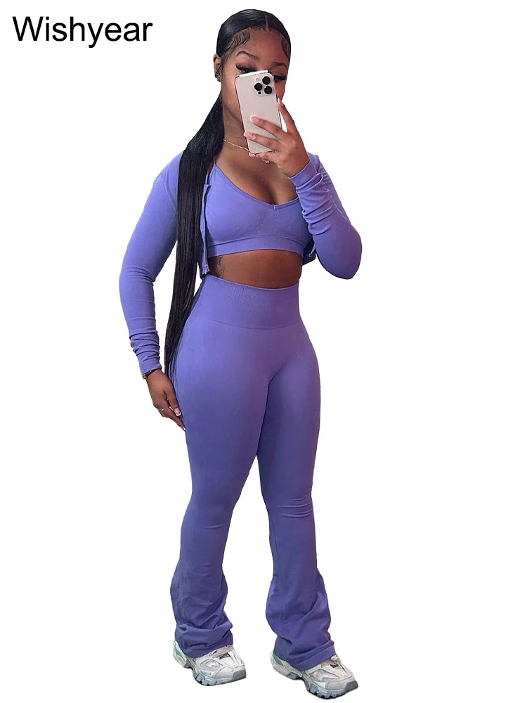 Chic Three-Piece Women's Activewear Set – Long Sleeve Crop Top, Tank, and Flare Pants