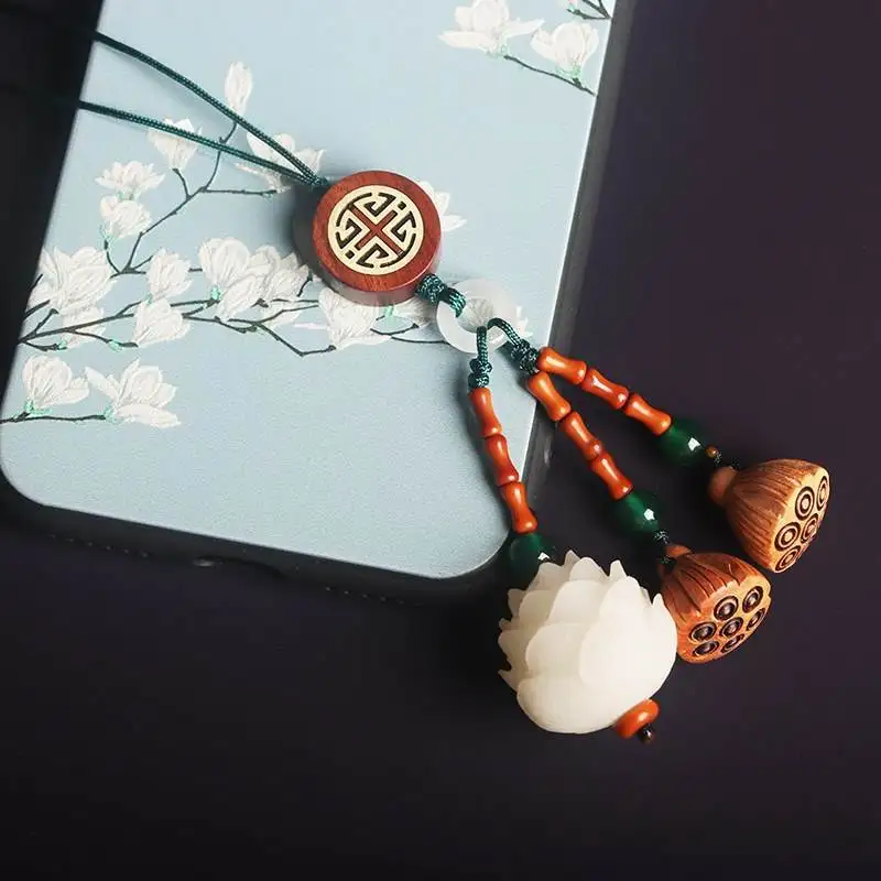 

Chinese element carving lotus money bag mobile phone pendant peach lotus pod keychain mobile phone chain pendant men and women