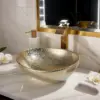 KEMAIDI 16" Gold Bathroom Sink Ceramic Vessel Sinks for Bathrooms Above Counter Bathroom Sink Oval Vessel Sink with Faucet Combo 3