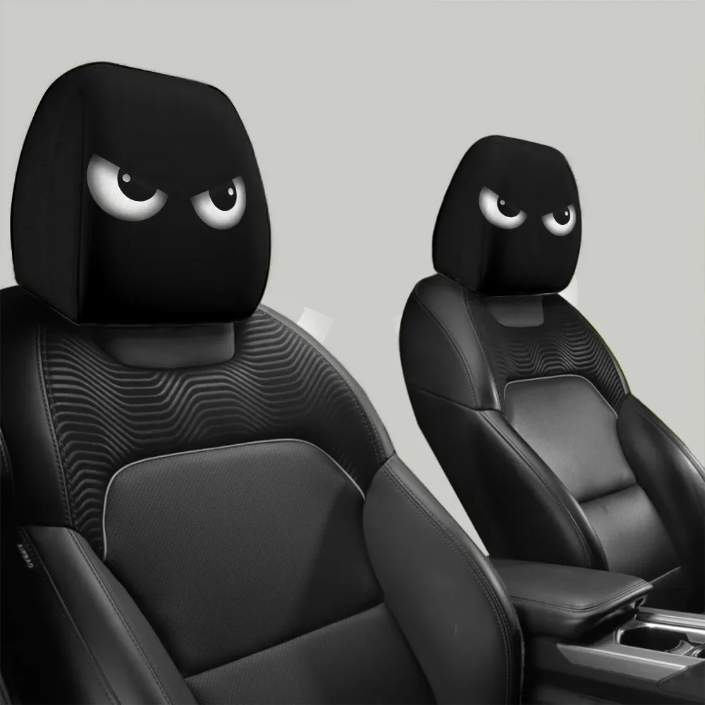 2 Stück lustige Auto-Kopfstützenabdeckungen mit schrägen Augen, elastischer Schutz mit Cartoon-Gesicht für Halloween, Weihnachten, Urlaubs-Auto-Dekoration