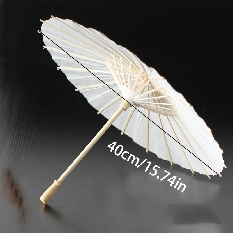 A white paper umbrella for wedding decoration-handmade traditional Chinese bridal sunshade-photo prop and party accessory
