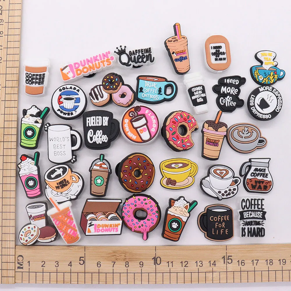 

Mix 50Pcs PVC Food Croc Charms Best Boss Macaron Make Coffee Not War Life Donut Drinks Outdoors Buckle Clog Garden Shoes Button