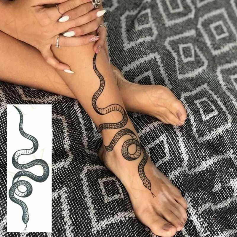 Snake tattoo by me Olivia Hartranft at Witch City Ink Tattoos Salem MA   Lines are healed  rtattoo