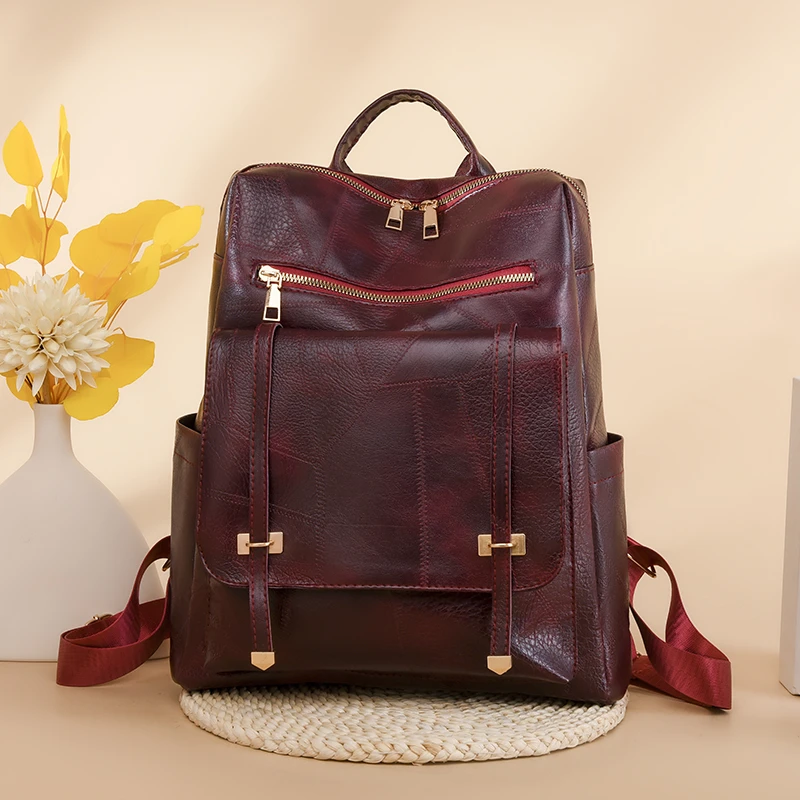 Women's artificial leather backpack with adjustable shoulder straps, stylish, zippered closure, polyester lining, large capacity