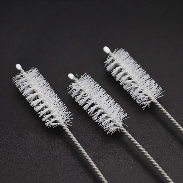 Sewing machine cleaning brush