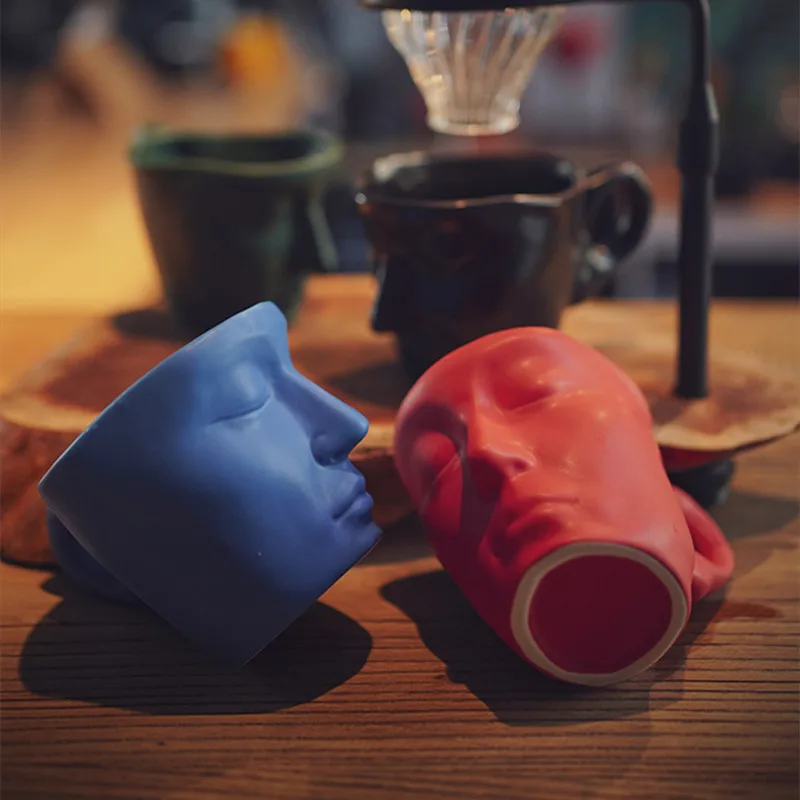 

New Nordic Creative Face Shape Porcelain Cup and Saucer Ceramics Tea Cup Modern Style Ceramic Coffee Cups Office Cup