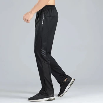 Pantaloni sportivi da uomo primavera autunno pantaloni sportivi sottili e traspiranti da corsa bodybuilding pantaloni elastici allentati e sottili con rilegatura del piede 1