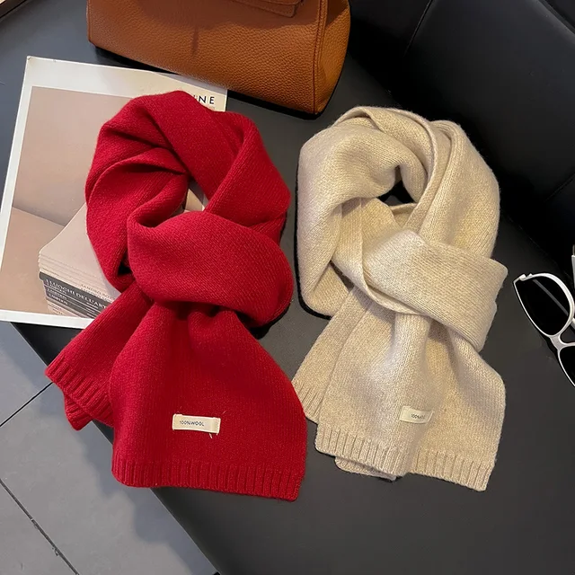 Stay warm and stylish with the Natural 100% Women New Sheep Wool Scarf Fashion Soft Solid Petite Knit Neckerchief Winter Thickened Warm Wool Brand Bandana.