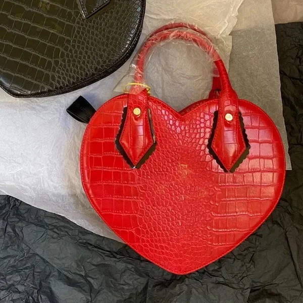 Ethnic style tassel bag rivet messenger bag ladies shoulder bag two-layer frosted cowhide mobile phone bag