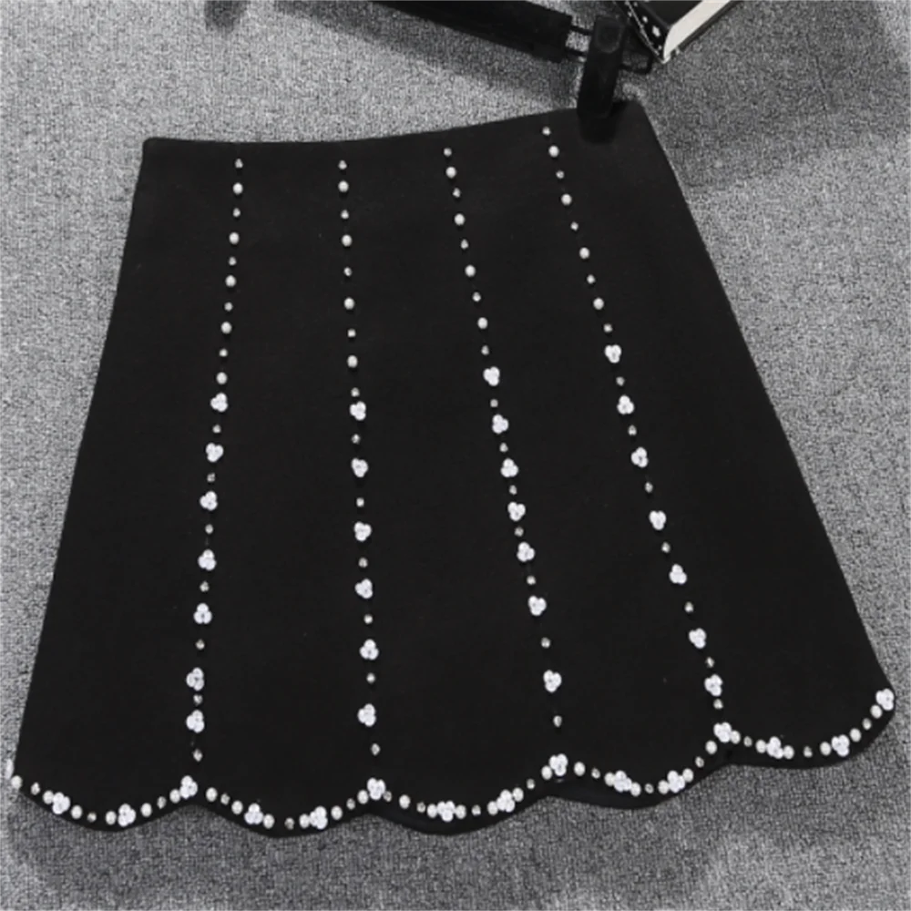 

Woolen short skirt female Spring and Autumn 2023 New high-waisted A line thick diamond skirt women