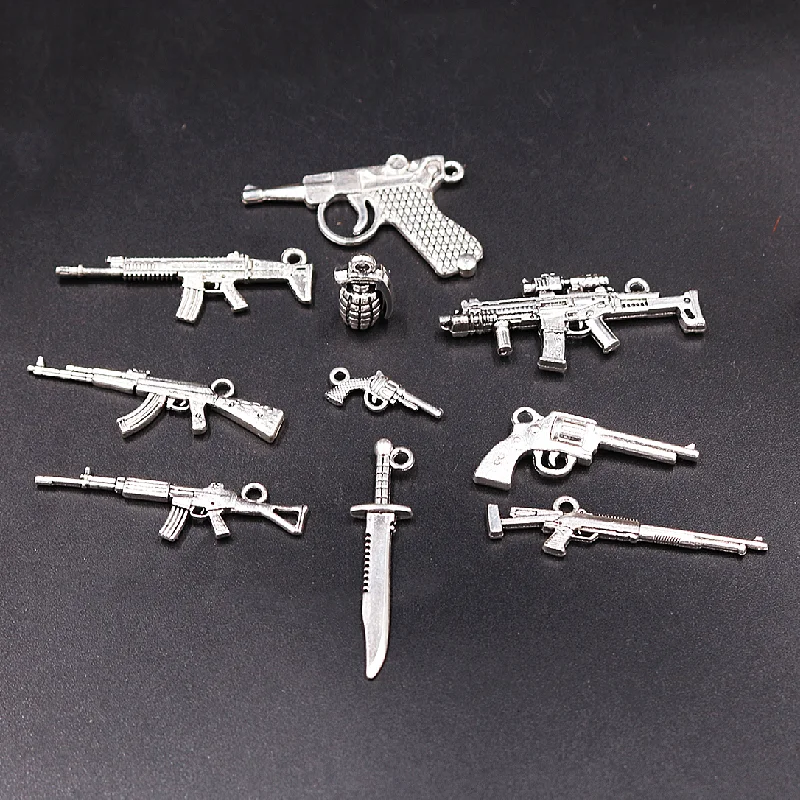 

10pcs Mixed Silver Plated Submachine GunGrenade Sabre Pistol Pendant DIY Charm Hip Hop Style Jewelry Crafts Making P1687