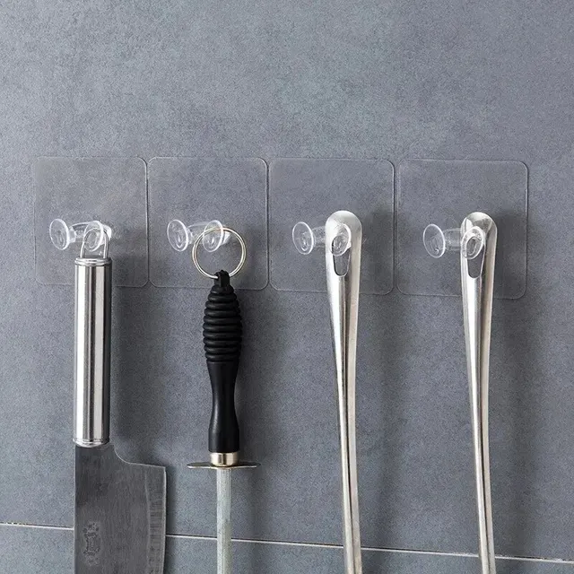 강력한 접착력과 투명한 방수 소재로 어떤 벽면에도 매끄럽게 조화를 이루는 다목적 PVC 벽 후크 전원 플러그 브래킷