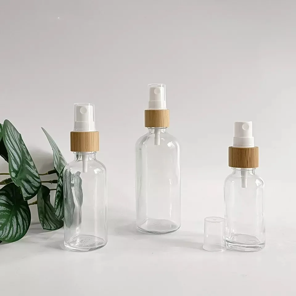 

Wholesale 5ml 10ml 15ml 20ml 30ml 50ml 100ml Refill Round Clear Perfume Atomizer Fine Mist Glass Spray Bottles with Bamboo Lid