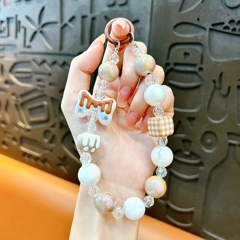 Elegant Anti-Lost Beaded Phone Charm Wrist Strap with Bow Accent