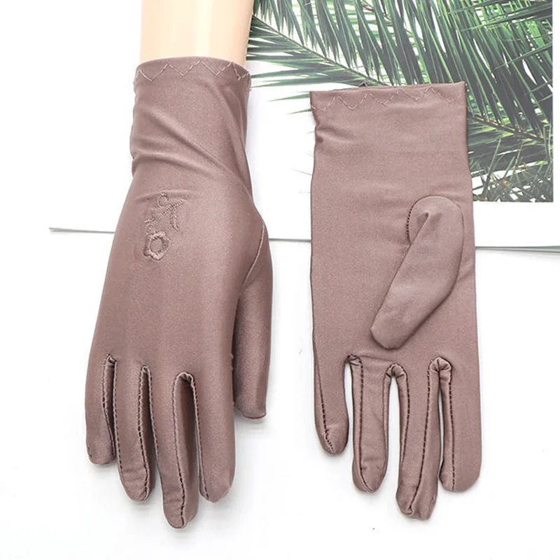 Summer sunscreen gloves spring and autumn thin model electric bike riding driving etiquette elastic jewelry lace UV protection