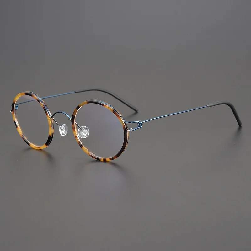 Sleek Ultralight Titanium Round Eyeglasses - Danish Handmade Design