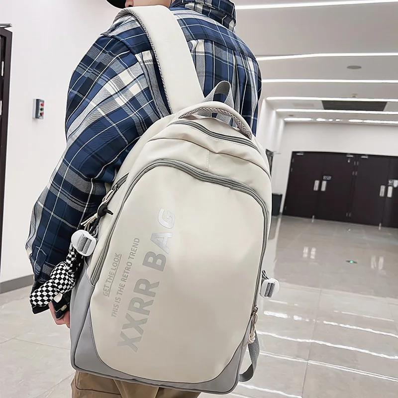 

Unisex Large Capacity High Quality Student Backpack Waterproof Boy Girl Schoolbag Casual Fashion Skateboard Pack Travel Bag Cool