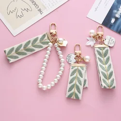 Elegant Leaf Pattern Wristlet Keychain Cute Pearl Shell Pendant With Keyrings and Strap For Women Keys Phones Wallets Decoration