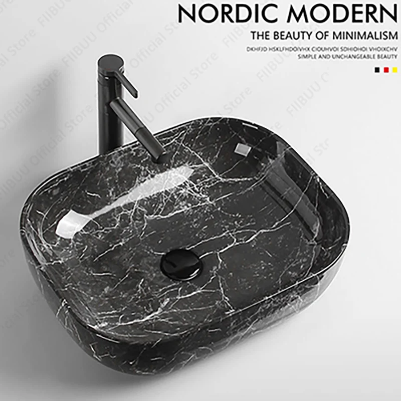 อ่างล้างจานเซรามิคสี่เหลี่ยมผืนผ้าหินสีดํารูปอ่างล้างหน้าชามรูปเรือเหนือเคาน์เตอร์อ่างล้างจานสําหรับระเบียงห้องน้ํา 1