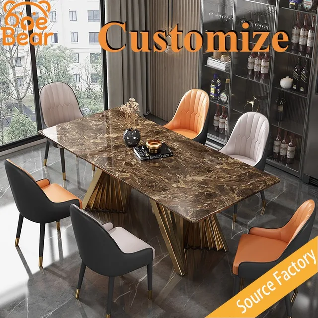 Table à manger en marbre avec structure en métal doré, mobilier élégant pour salle à manger et chambre d'hôtes. 1