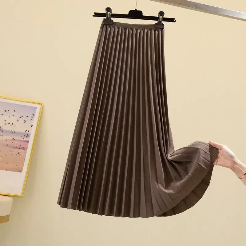 Falda de longitud media adelgazante acampanada plisada de cintura alta para mujer para otoño primavera