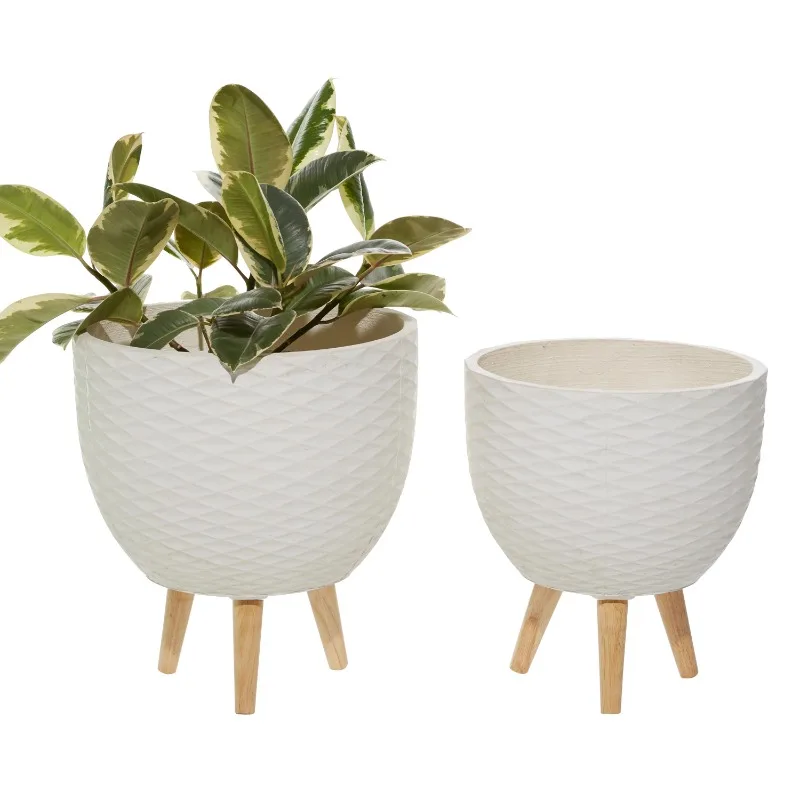 

DecMode 16", 14"H Indoor Outdoor White Ceramic Planter with Wood Legs (2 Count) Indoor Plant Pots