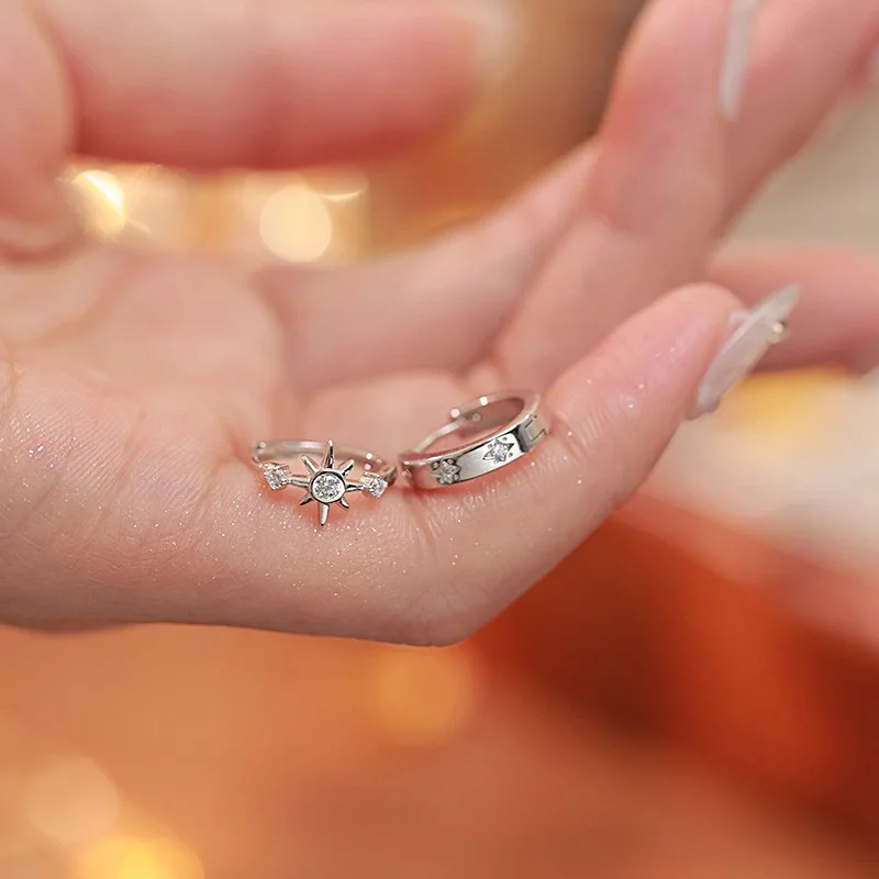 Zircon star asymmetry hoop earrings close-up