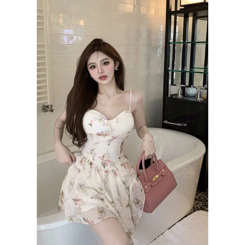 

French Sexy Spicy Girl Slim Cut Floral Suspender Dress 2023 Summer Women's Clothing Waist Shows Thin Temperament A-line Skirt