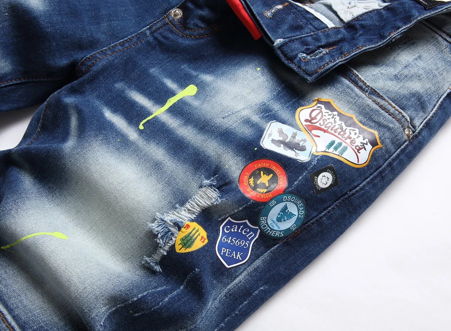 New summer ripped and painted denim shorts men thin wear fashionable five quarter pants fashion hot picture