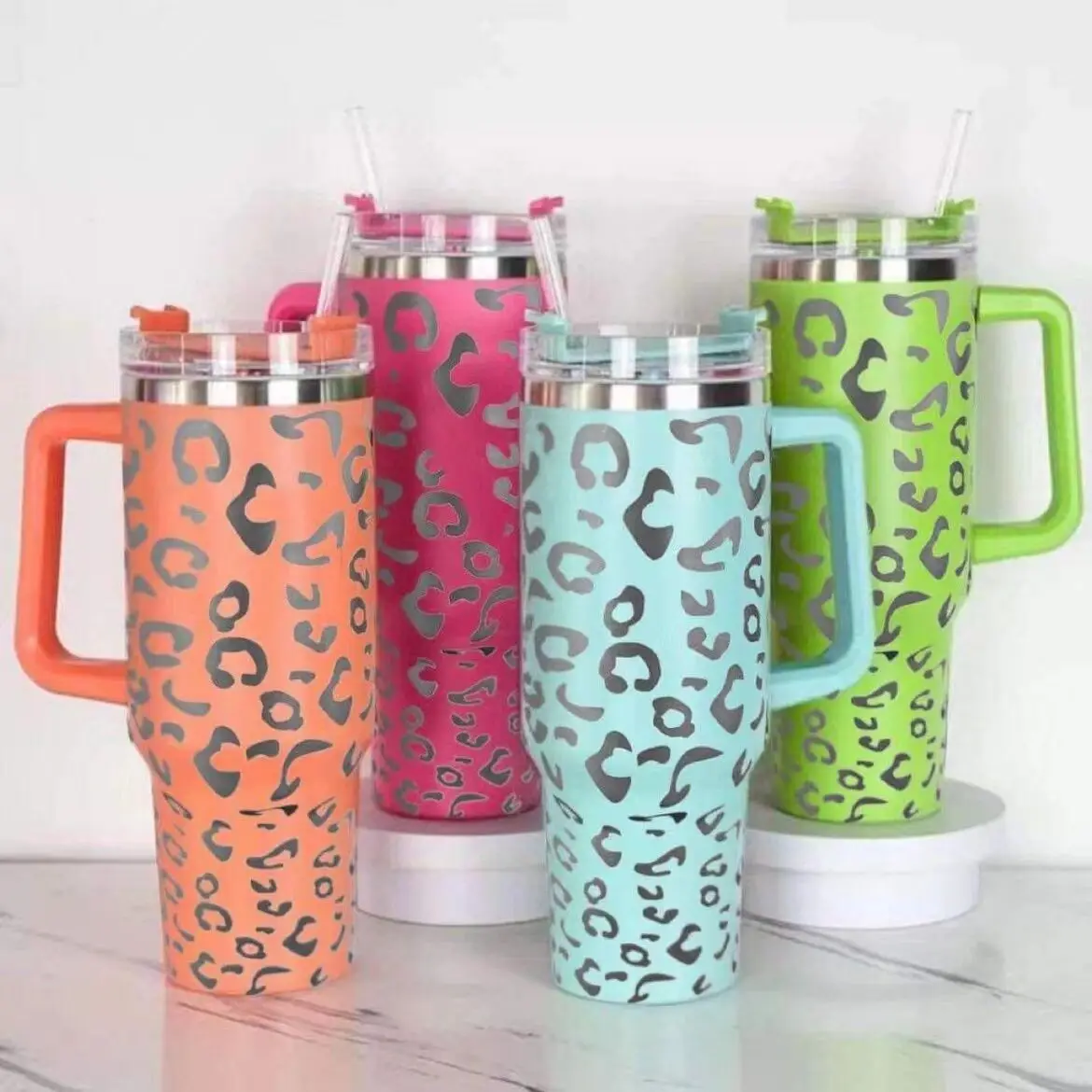 https://ae01.alicdn.com/kf/S7348e398897445e4adfefc452b8559aaD/75pcs-Leopard-stainless-steel-tumbler-with-lid-straw-cheetah-handdle-tumbler-Laser-Engraved-mug-cup-beer.jpg