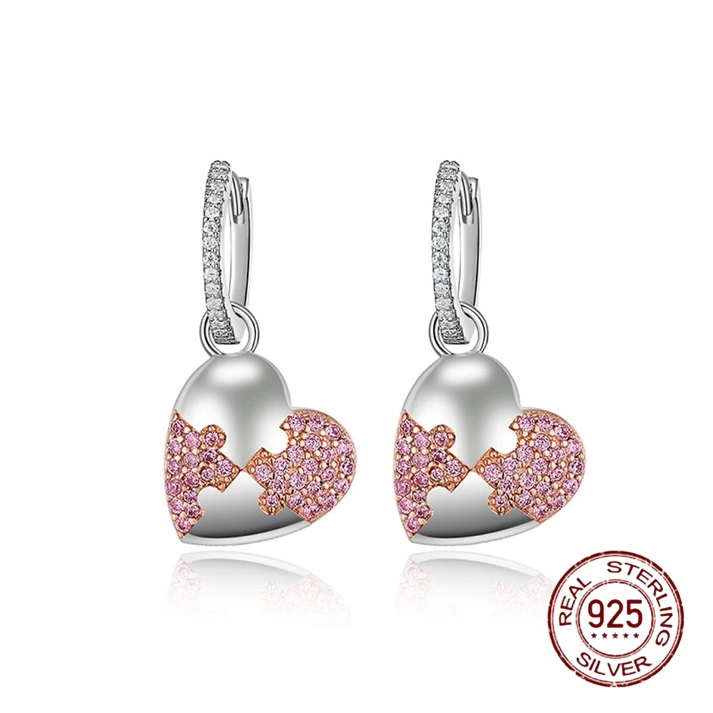 

Серьги-гвоздики из серебра 925 пробы с розовым кристаллом и фианитом