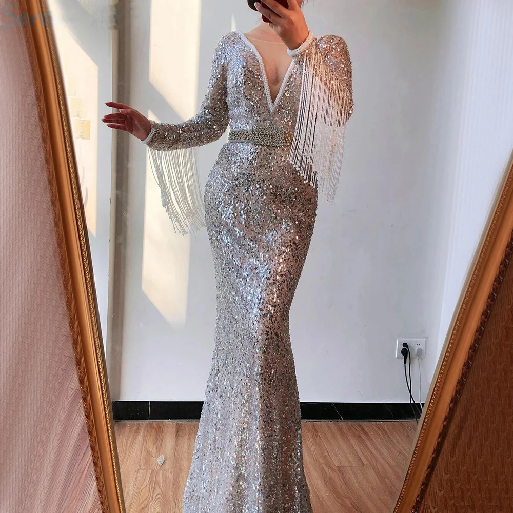 

Full Sequins Reflective Mermaid Silver Evening Dresses Beads Deep V Neck Long Sleeves Prom Party Gowns With Tassels Sweep Train
