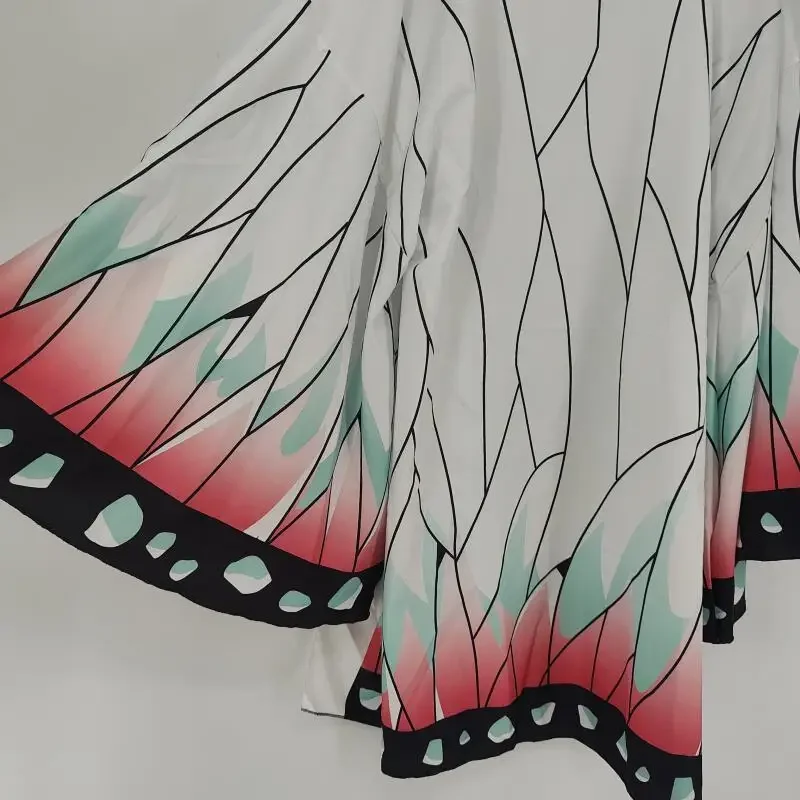 Butterfly motif displayed across cloak fabric
